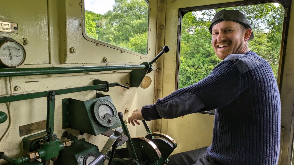 a man standing in front of a mirror posing for the camera