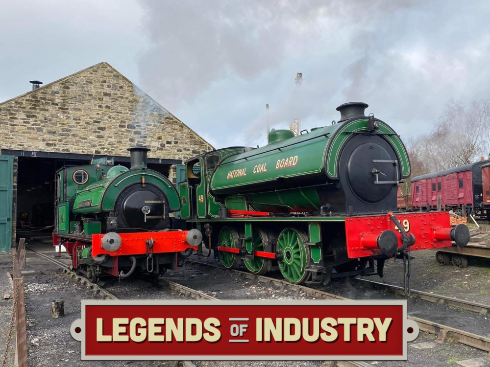 Two green steam locomotives outside a stone building, labeled 'Legends of Industry' on the bottom.